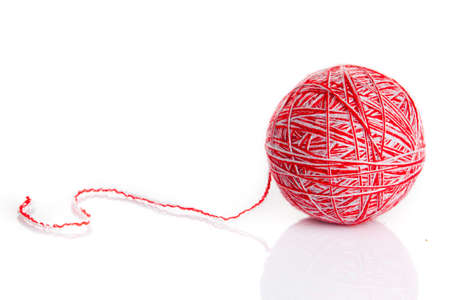 Ball of knitting yarn on a white backgroundの写真素材