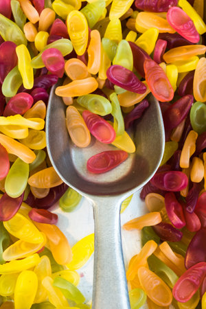 Background made of colorful sweets and candies. assortment colorful gummy candies at marketの写真素材