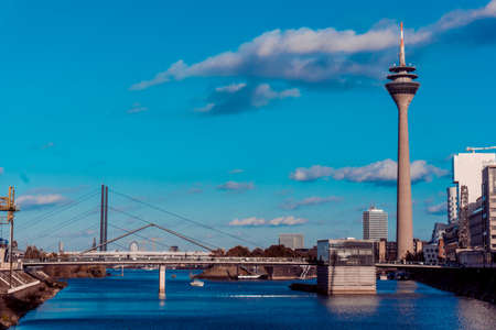 DUSSELDORF, GERMANY - NOVEMBER 08: the media harbour with Rhine Tower and Gehry Houses on November 08, 2014 in Dusseldorf. The Gehry Houses are designed by world renowned architect Frank O. Gehry.のeditorial素材