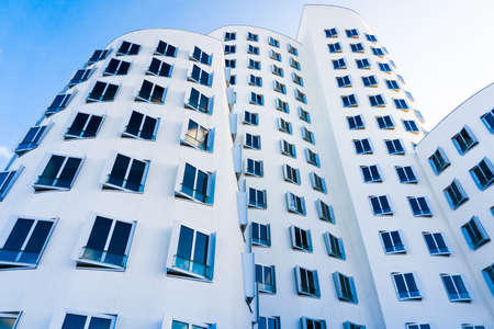 DUSSELDORF, GERMANY - NOVEMBER 8 : Neuer Zollhof building on November 8, 2014 in Dusseldorf, Germany. The building was designed by famous Frank Gehry and completed in 1998.のeditorial素材
