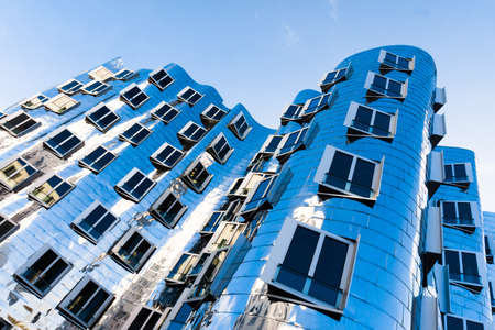 DUSSELDORF, GERMANY - NOVEMBER 08, 2014: View of the Neuer Zollhof in Media Harbor in Dusseldorf, Germany. This building complex was designed by Frank O. Gehry and completed in 1998.のeditorial素材
