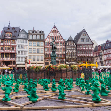 FRANKFURT, GERMANY - SEPTEMBER 19, 2015: figures from Ottmar Hoerl to celebrate the 25th anniversary of Germanys reunion in Frankfurt, Germany on public places.のeditorial素材
