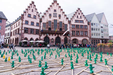 FRANKFURT, GERMANY - SEPTEMBER 19, 2015: figures from Ottmar Hoerl to celebrate the 25th anniversary of Germanys reunion in Frankfurt, Germany on public places.のeditorial素材