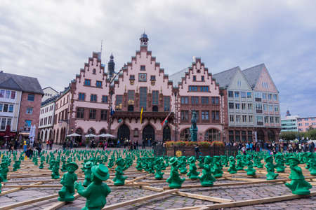 FRANKFURT, GERMANY - SEPTEMBER 19, 2015: figures from Ottmar Hoerl to celebrate the 25th anniversary of Germanys reunion in Frankfurt, Germany on public places.のeditorial素材