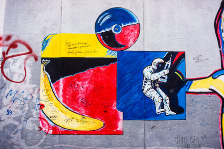 BERLIN, GERMANY - MARCH 20: Berlin Wall graffiti seen on March 22, 2015, Berlin, East Side Gallery. It's a 1.3 km long part of original Berlin Wall which collapsed in 1989のeditorial素材