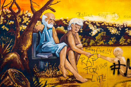 BERLIN, GERMANY - MARCH 20: Berlin Wall graffiti seen on March 22, 2015, Berlin, East Side Gallery. It's a 1.3 km long part of original Berlin Wall which collapsed in 1989のeditorial素材