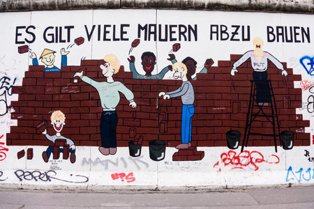 BERLIN, GERMANY - MARCH 20: Berlin Wall graffiti seen on March 22, 2015, Berlin, East Side Gallery. It's a 1.3 km long part of original Berlin Wall which collapsed in 1989のeditorial素材