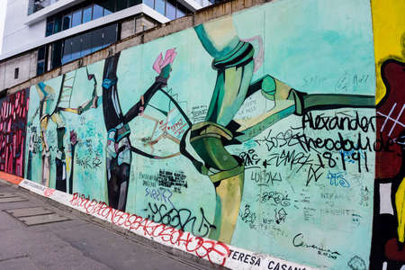 BERLIN, GERMANY - MARCH 20: Berlin Wall graffiti seen on March 22, 2015, Berlin, East Side Gallery. It's a 1.3 km long part of original Berlin Wall which collapsed in 1989のeditorial素材