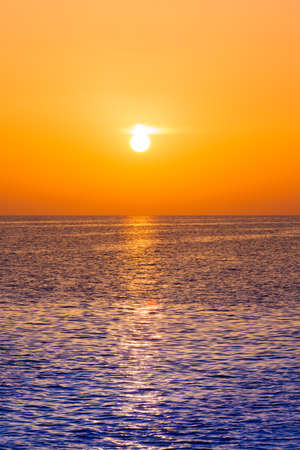 Beautiful sunset above the sea.  Scenic view of beautiful sunset. Tropical sunset on the beachの写真素材