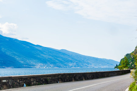 mountain road.  asphalt road and sea.  asphalt roadの写真素材