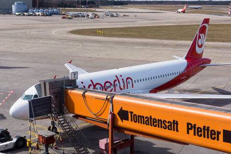 BERLIN, GERMANY - MARCH 21, 2015: Air Berlin aircraft parks at the gate in Tegel airport, Berlin, Germany. The AirBerlin is the second largest airline in Germanyのeditorial素材