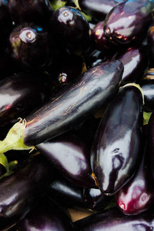 Fresh juicy aubergine.  eggplants at marketの写真素材