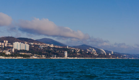 SOCHI, RUSSIA January, 2016: View of the beach in the Sochi, Russia. Cityscape of Sochi and riverのeditorial素材