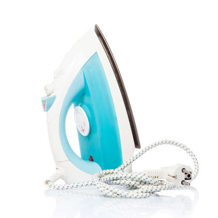 Steam iron isolated on white backgroundの写真素材