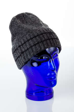 Wool knitted winter hat isolated on white backgroundの写真素材