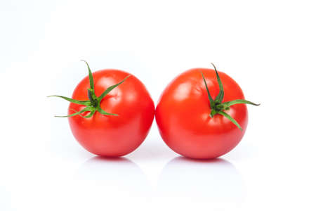Tomato isolated on whiteの写真素材
