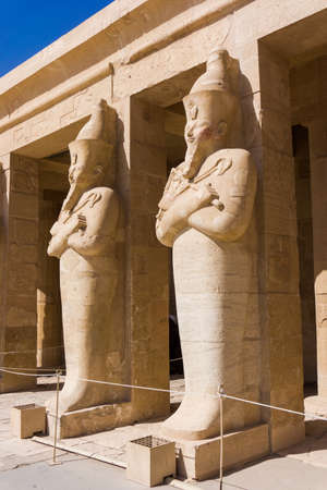 The temple of Hatshepsut near Luxor in Egypt.  Statues on facade of palace of Hatshepsutのeditorial素材