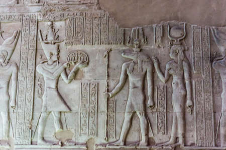 Hieroglyphic carvings on the exterior walls of  egyptian templeの写真素材