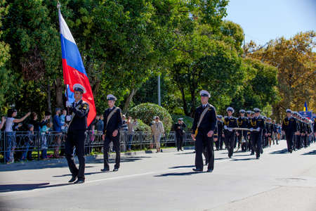 RUSSIA, SOCHI - SEPTEMBER 24, 2016 :SCF Black Sea Tall Ships Regatta 2016. Ship teams parade from sailing shipsのeditorial素材