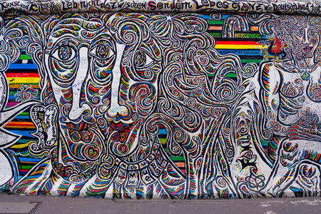 BERLIN, GERMANY - MARCH 20: Berlin Wall graffiti seen on March 22, 2015, Berlin, East Side Gallery. It's a 1.3 km long part of original Berlin Wall which collapsed in 1989のeditorial素材