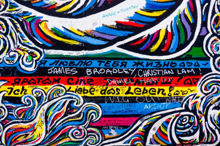 BERLIN, GERMANY - MARCH 20: Berlin Wall graffiti seen on March 22, 2015, Berlin, East Side Gallery. It's a 1.3 km long part of original Berlin Wall which collapsed in 1989のeditorial素材