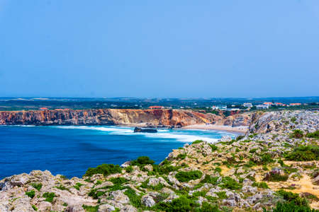Ocean wave background. Cliff coastline in Sagres, Algarve, Portugalの写真素材