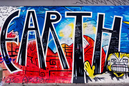 BERLIN, GERMANY - MARCH 20: Berlin Wall graffiti seen on March 22, 2015, Berlin, East Side Gallery. It's a 1.3 km long part of original Berlin Wall which collapsed in 1989のeditorial素材