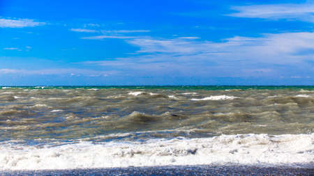 View of storm seascape.  Sea background. Waves.  waves crashing on shoreの写真素材