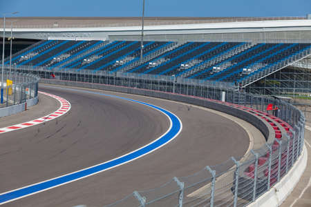 Motor racing track. Turning asphalt road with marking linesのeditorial素材