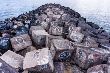 SANTA CRUZ DE TENERIFE, SPAIN - JANUARY 25: Graffiti on a stones of a breakwater on January 25, 2017 in Santa Cruz de Tenerife, Spainのeditorial素材