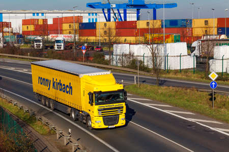 DUSSELDORF ,GERMANY - FEBRUAR 16: transport truck on the highway on Februar 16,2016 in Dusseldorf, Germany. truck on asphalt roadのeditorial素材
