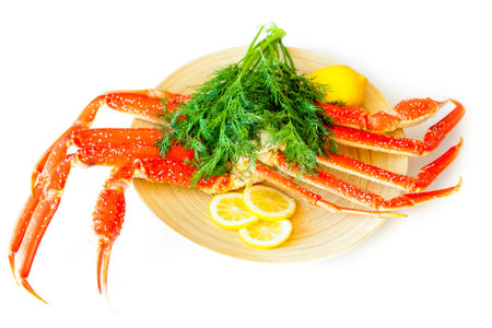 crab legs with lemon on a plate. Steamed crabの写真素材