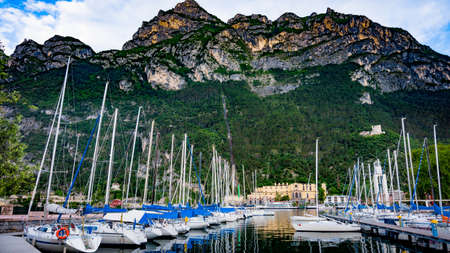 lago di Garda. Boats in the harbor. Sailing boats yachts on Garda lakeのeditorial素材
