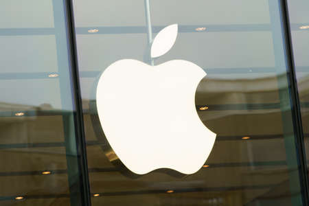 DUSSELDORF, GERMANY - APRIL  14, 2017: Apple sign on the Apple store in Dusseldorf. Apple is an American multinational technology company headquartered in Cupertino, Californiaのeditorial素材