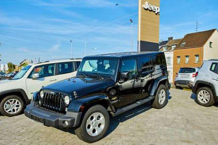 MOENCHENGLADBACH, GERMANY - APRIL 30, 2017: Beautiful JEEP Car parking in front of car store