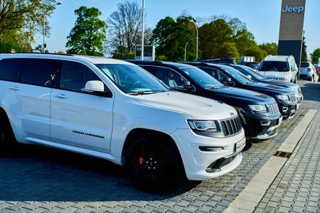 MOENCHENGLADBACH, GERMANY - APRIL 30, 2017: Beautiful JEEP Car parking in front of car storeのeditorial素材