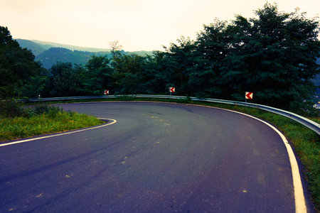 asphalt road. road in forestの写真素材