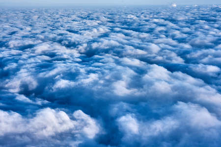 clouds and blue sky seen from airplaneの写真素材