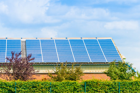 Solar panel on a roof of a house.  alternative energy photovoltaic solar panels