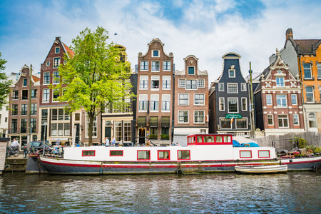 Amsterdam, the Netherlands, September 5, 2017 :typical dutch houses and houseboats. Amsterdam, Holland, Netherlandsのeditorial素材
