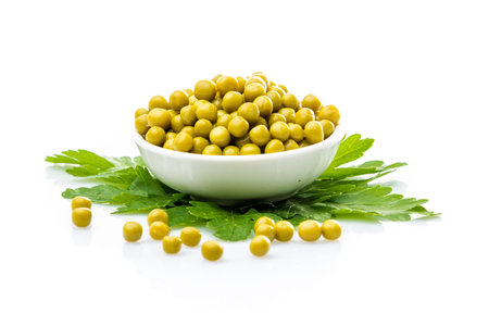 green peas  in a bowl isolated, white backgroundの写真素材