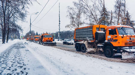 MOSCOW, RUSSIA - NOVEMBER 22, 2016: Snowplow cleans from the road snow in Moscowの写真素材