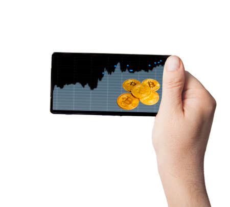 Smartphone with Bitcoin Cash surge chartの写真素材