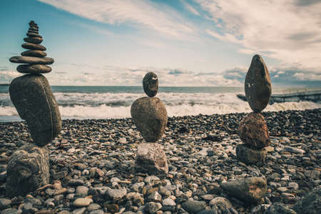 Balance stones against the seaの写真素材