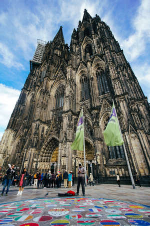 COLOGNE, GERMANY - November 07, 2018: Tourists walk around beneath Cologne's cathedral on November 07, 2018 in Cologne, Germanyのeditorial素材