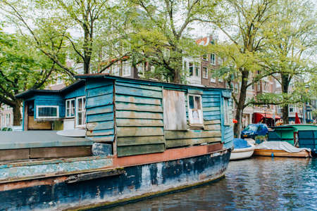 Amsterdam, Netherlands-September 5, 2017: Old barge stands on one of Amsterdam's canals.のeditorial素材