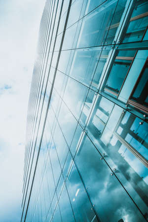 Abstract fragment of modern architecture, walls made of glassの写真素材