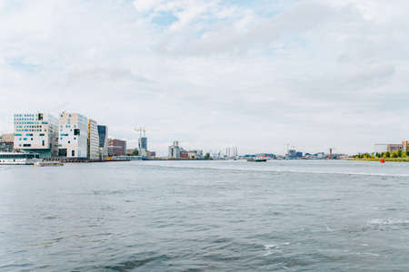 Panoramic view of Amsterdam from the boatの写真素材