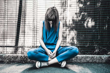 Portrait of a beautiful  girl wearing blue dressの写真素材