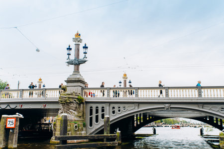 Amsterdam, Netherlands September 5, 2017: Bridge and Amstel river.